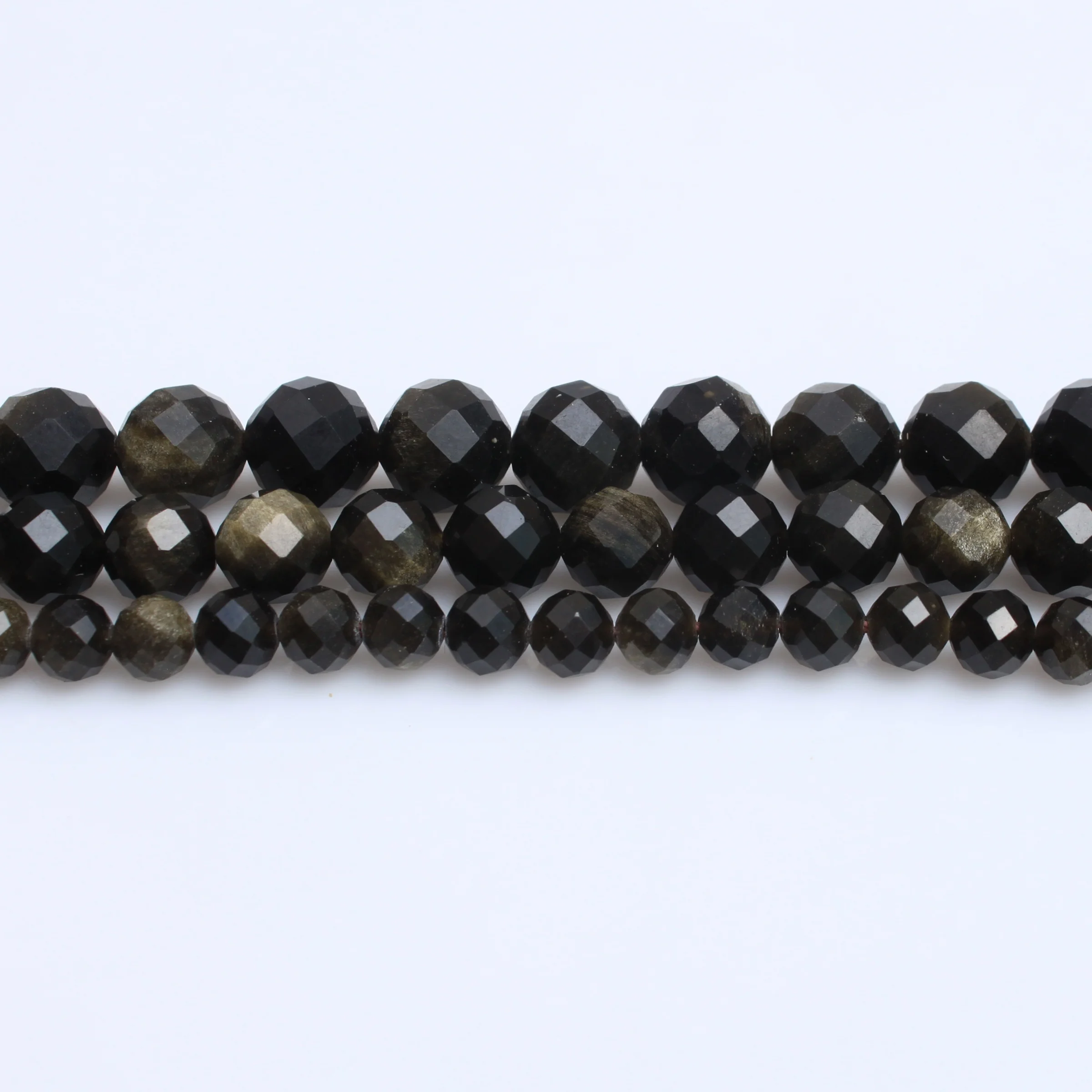 

Factory direct sales of AAAA grade gold obsidian carved cut surface shaped round beads DIY bracelet accessories