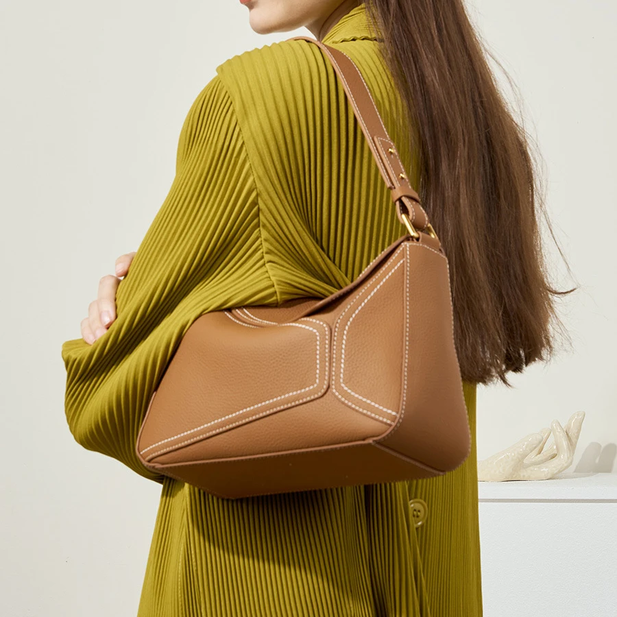 

Top layer cowhide underarm bag 2025 new niche design soft genuine leather geometric women's commuting one-shoulder crossbody bag