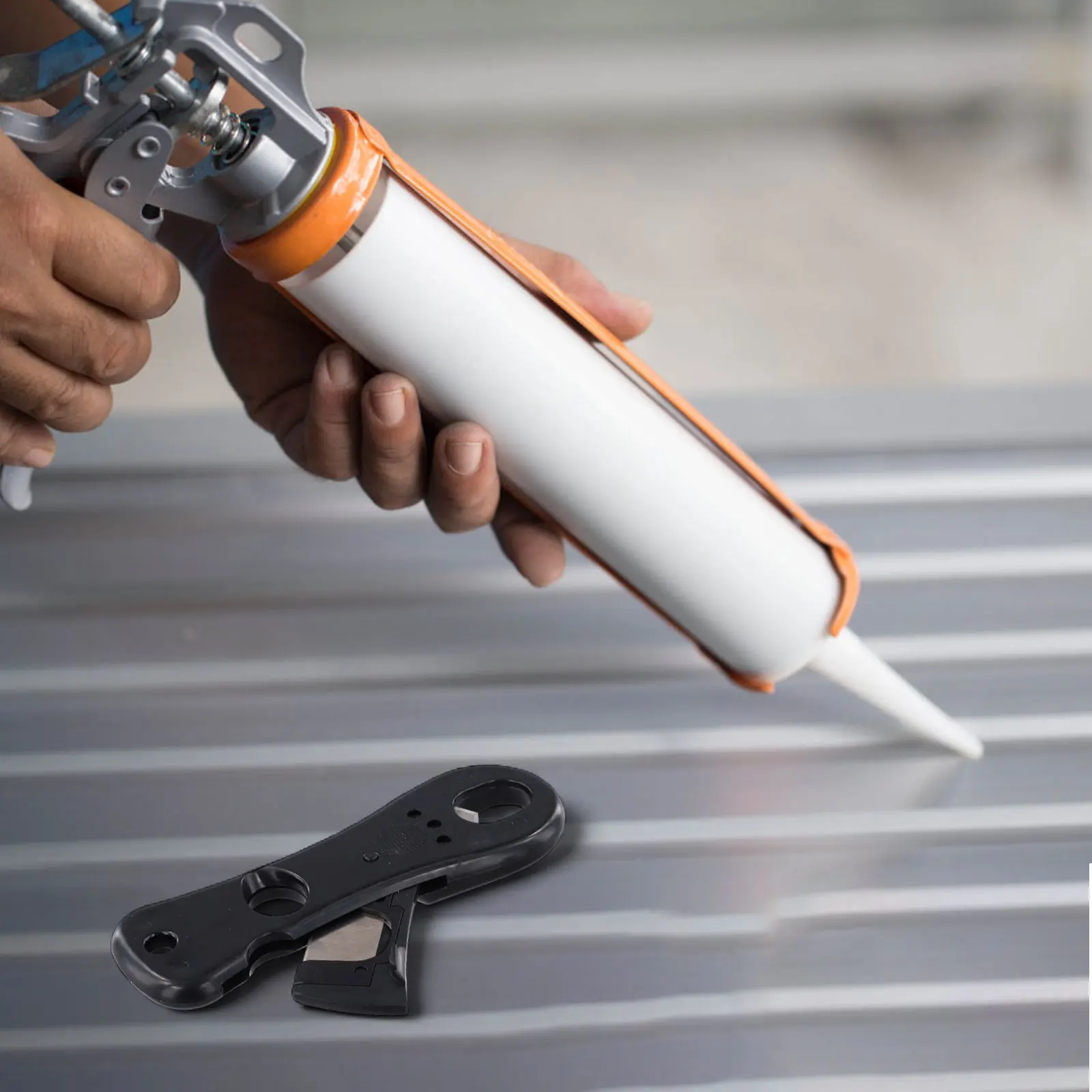 Metal Caulking Nozzle Cutter for Silicone and Acrylic Sealants with Dual Function Cutting and Bottle Opening Capability