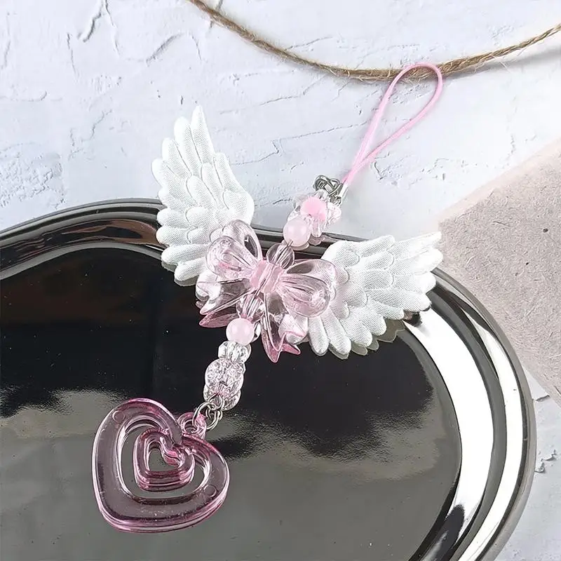 Modischer, lieblicher Anhänger mit Flügeln, Schleife und Herz für Mobiltelefone, süßer Schlüsselanhänger, Accessoire für Damenhandtaschen, Geschenk. – Detail 4