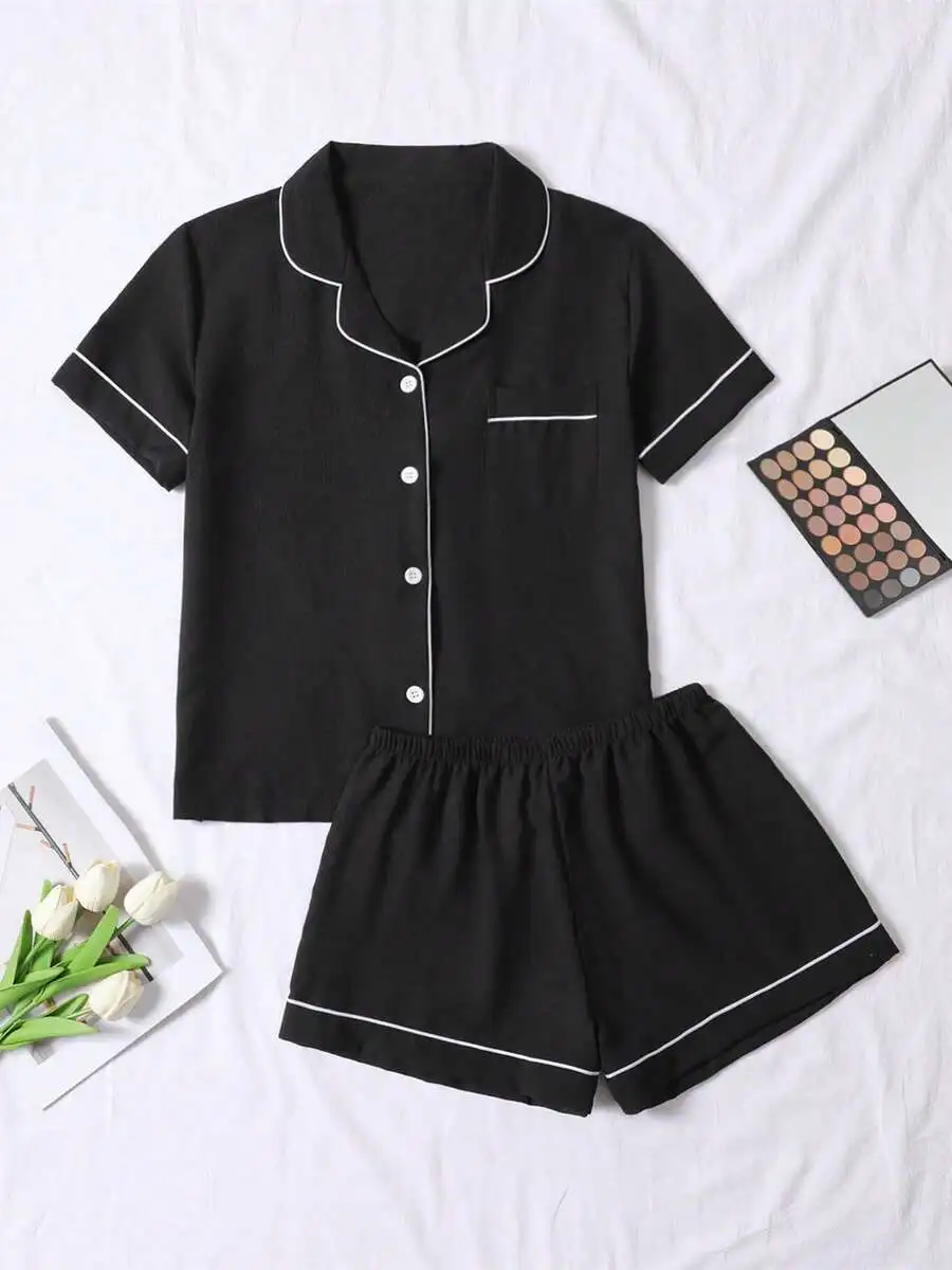 

2-Piece Black Crinkle Pajama Set with White Piping, Short Sleeve Button-Up Top and Elastic Waist Shorts