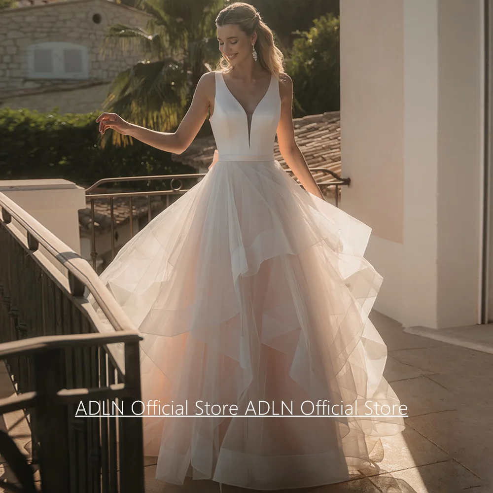 

Brush Pink Wedding Dress Customized Deep V Neck Sleeveless Back Zipper Bow Sweep Train Ruffles Tulle A Line Bridal Gown