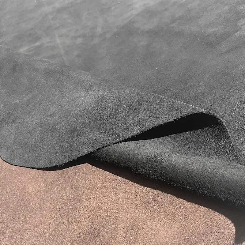 جلد البقر الصوفي على الوجهين، جلد طبيعي، سترة جلدية سوداء من جلد الغزال، أحذية داخلية، قماش مضاد للصوف.