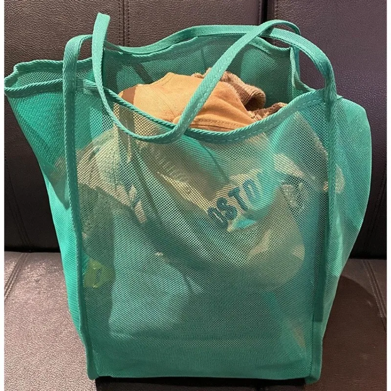 New transparent mesh shoulder bag, stylish and lightweight, with ample capacity, versatile for shopping, beach bag.