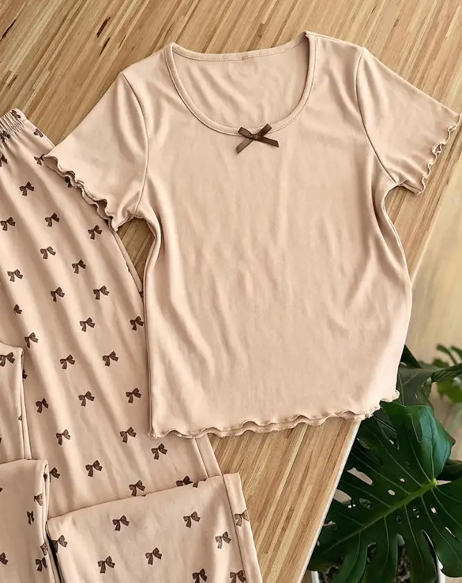 

Two Piece Set Women Outfit 2026 Spring New Round Neck Short Sleeved T-Shirt Top & Bow Printed Drawstring Elastic Pants Set