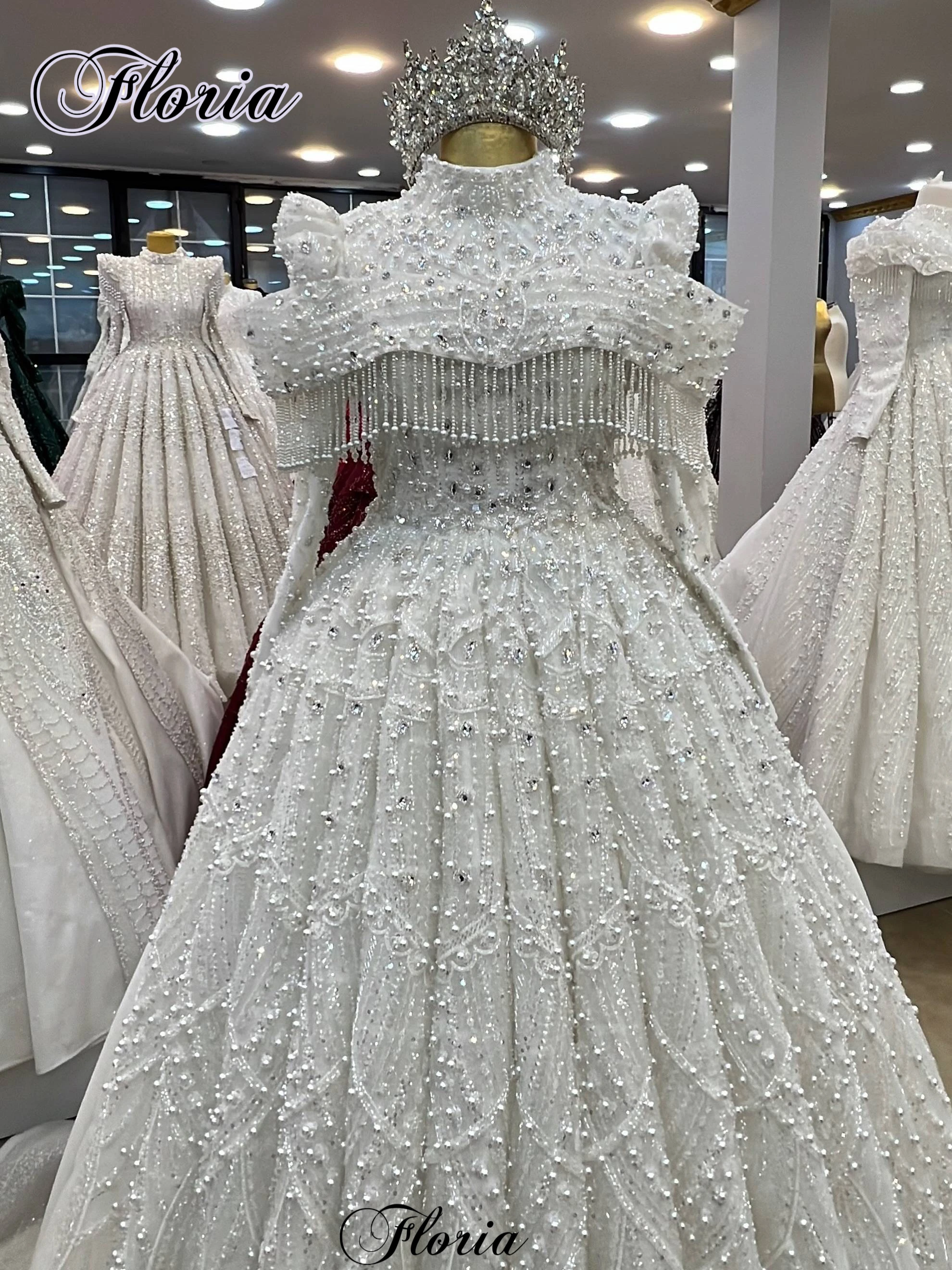 Luxuriöse Perlenbesetzte Muslimische Hochzeitskleider mit Kristallen Langarm-Brautkleider Kapellen-Schleppkleider Vestido Blanco Maßanfertigung