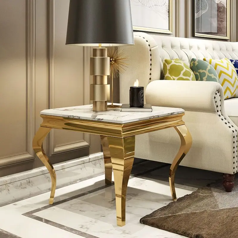 A few small coffee tables with luxurious gold edges. Marble tempered glass cube A few high-grade square corners beside the sofa