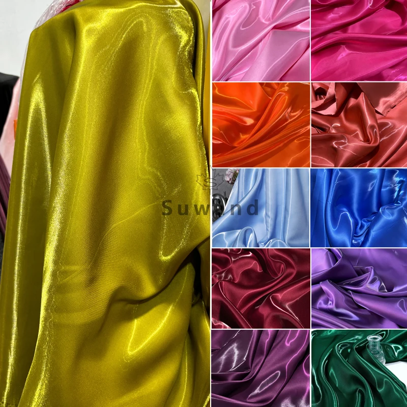 Neue Farbe Luxus glänzend flüssiger Satin Stoff glänzender Wasserglanz Seidensatin für Hochzeitskleid Anzug Kleidung Designer DIY Material