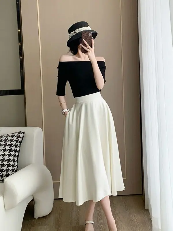 

Новый летний модный комплект в стиле Хепберн: элегантный женский костюм из двух предметов — черная футболка с вырезом-лодочкой и коротким рукавом + атласная юбка А-силуэта