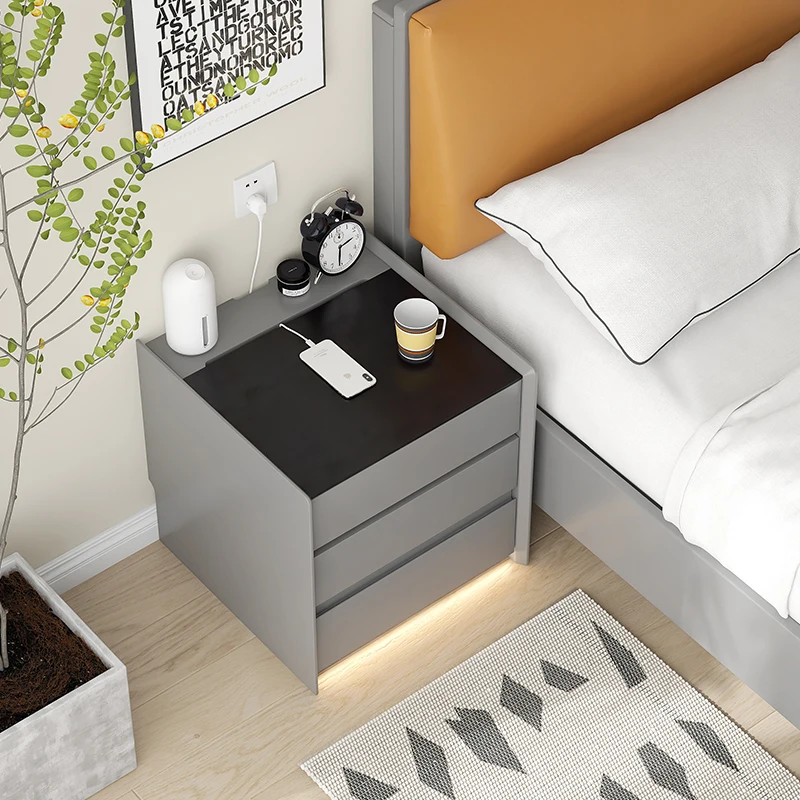 Modern bedroom with Italian minimalist 3-drawer bedside table with lamp