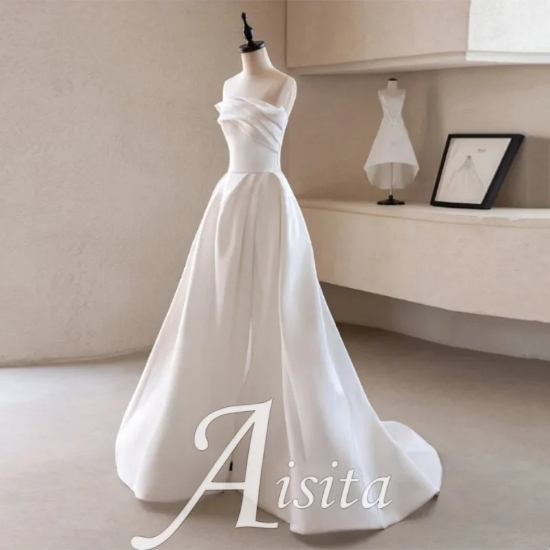 

2024 Women Elegant Sexy Strapless Long Prom Party Dress Luxury White Satin Trailing Wedding Dresses for Bride vestidos