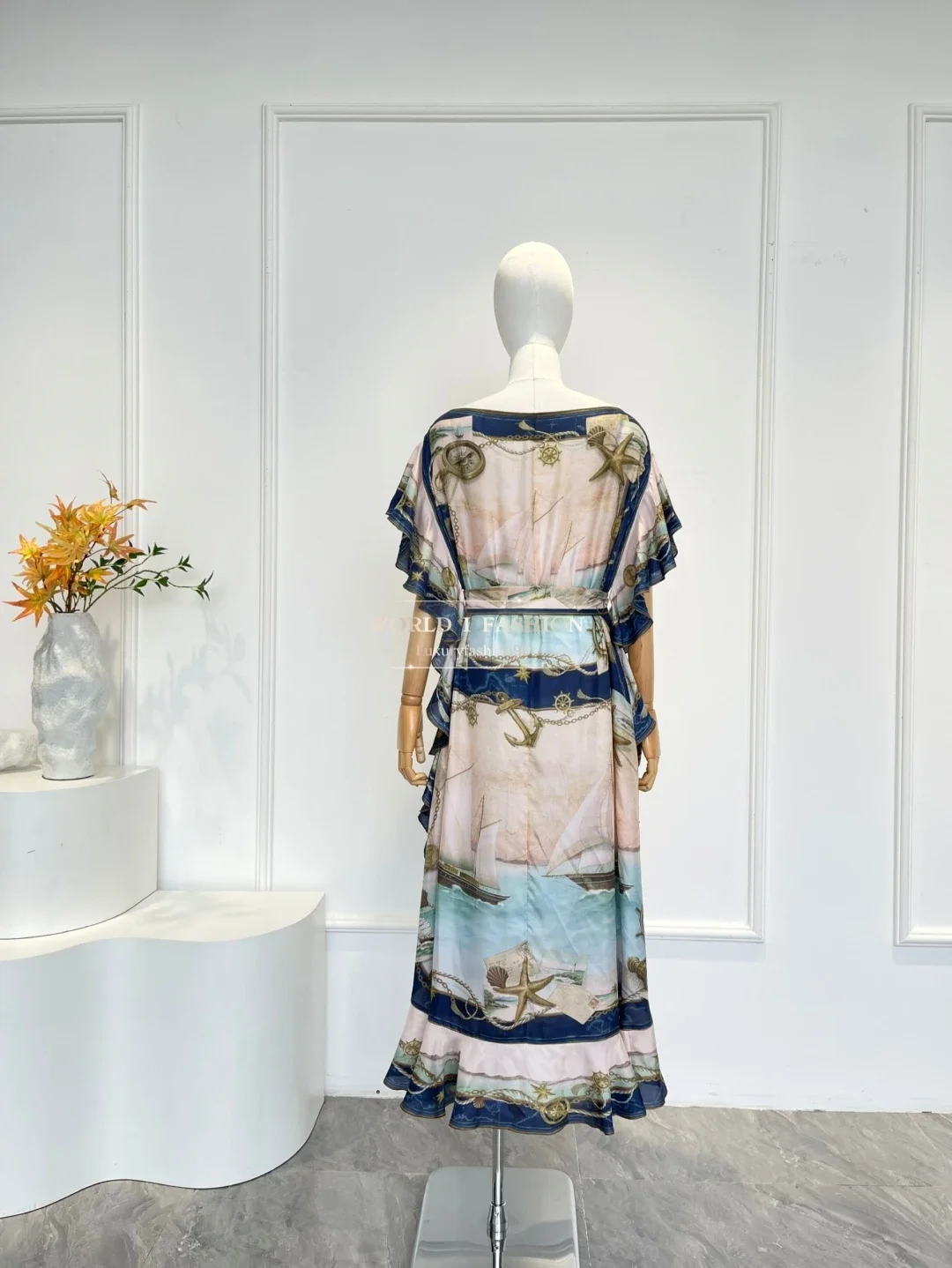 Sukienki midi z krótkim rękawem z nowym wzorem na rok 2025, z czerwonymi kwiatami i nadrukiem rozgwiazd, idealne na imprezy i święta.