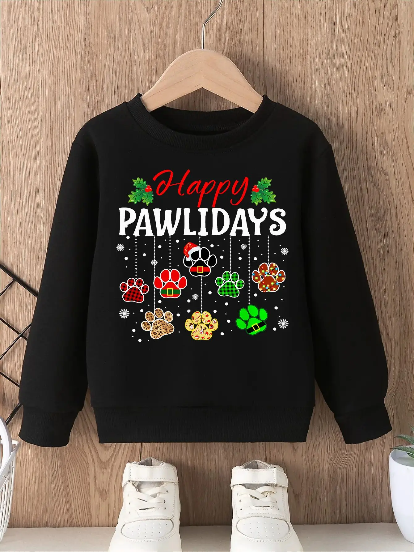 

Happy Pawlidays boys' pullover sweatshirt with festive paw print design, cozy and stylish round neck long sleeves top