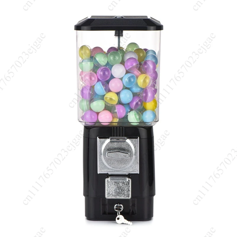 Coin operated egg machine, home candy machine, childhood surprises and memories