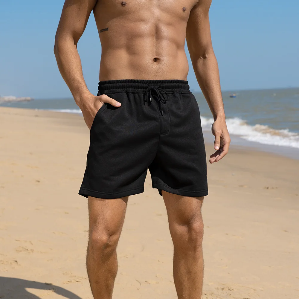 กางเกงขาสั้นลําลองผู้ชายเข่าความยาวกางเกงขาสั้นสายรัดหลวม Fit ฤดูร้อนสบายๆ 2025 Spliced Breathable กระเป๋า Patchwork