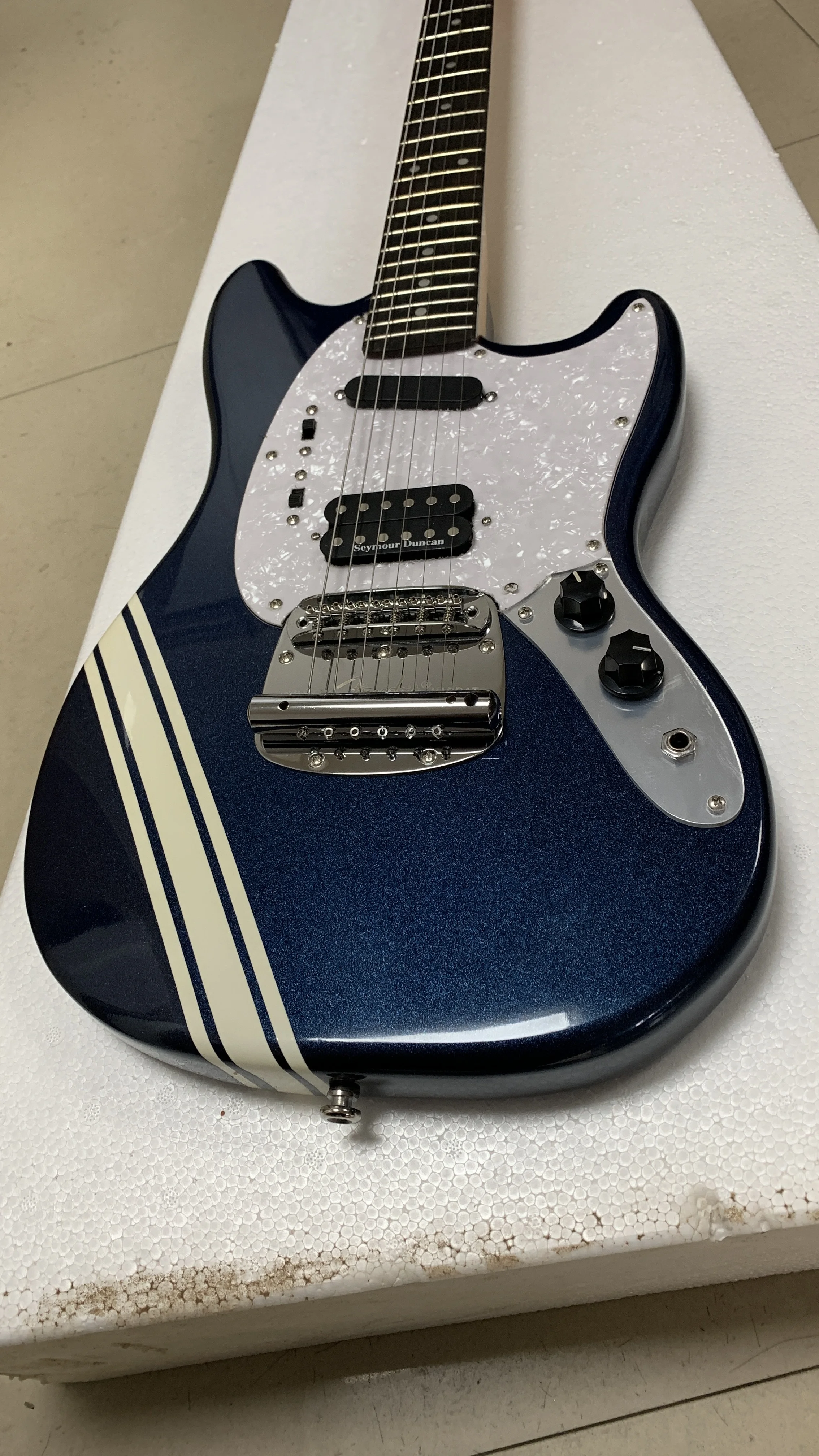 High-end custom 6-string electric guitar, metal blue body, special sticker design, support customization, free delivery