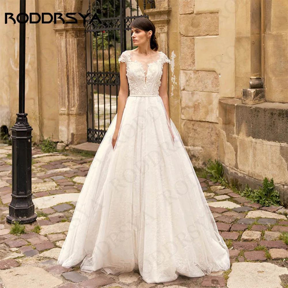 RODDRSYA Vestidos De Novia 3D Flowers Cap Sleeves Wedding Dress Elegant Tulle Bridal Lace A Line O Neck Pearls Belt Bride Gown