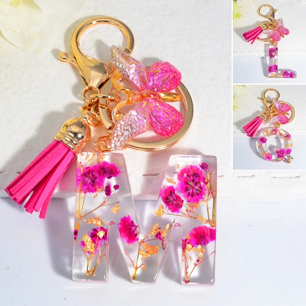 Exquisite Pink Dry Flower Resin 26 Initial Keychain Butterfly Tassel Pendant A to Z Keyring for Women Valentines Day Gift Urn