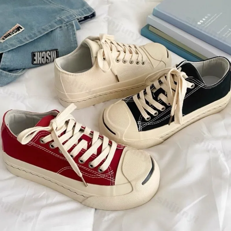 Par de zapatos de lona a la moda para primavera y otoño, zapatos informales con plataforma y cordones para mujer, zapatos planos cómodos antideslizantes con aumento de altura para hombre