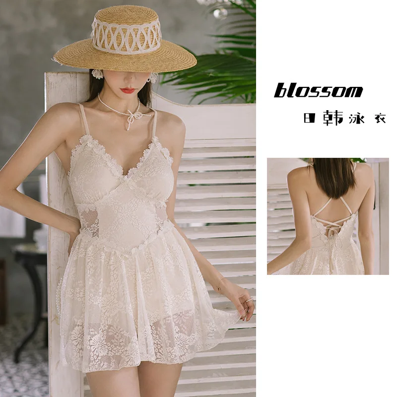 2023 New Fairy Swimwear Women's Hot Selling Lace Slim Skirt One Piece White with Chest Cushion Strap Open Back Swimwear White