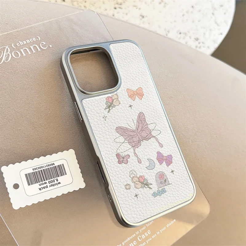 حافظة هاتف إنس لاكي فراشات وزهور جلدية لهاتف آيفون 11/12/13/14/15/16/17 برو ماكس اير بلس