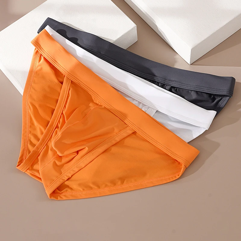 

Мужские трусы из ледяного шелка с высокой вилкой и выпуклым мешочком, мужское сексуальное дышащее белье, треугольные трусики, бесшовное нижнее белье