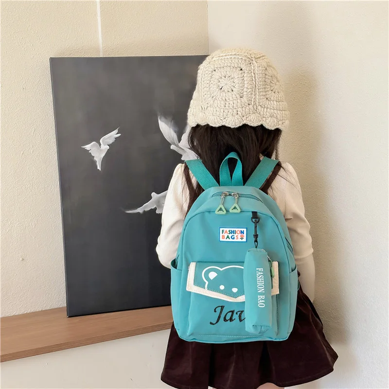 Sac à dos de maternelle avec nom personnalisé, sac de voyage mignon pour fille, sac à dos de loisirs pour garçon d'école primaire, étui à crayons, pendentif