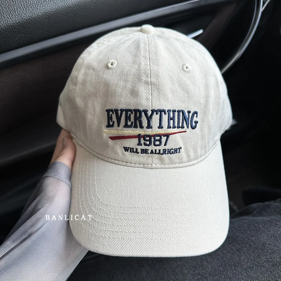 

American retro washed cotton embroidered letter baseball caps for men and women with wide brim and face