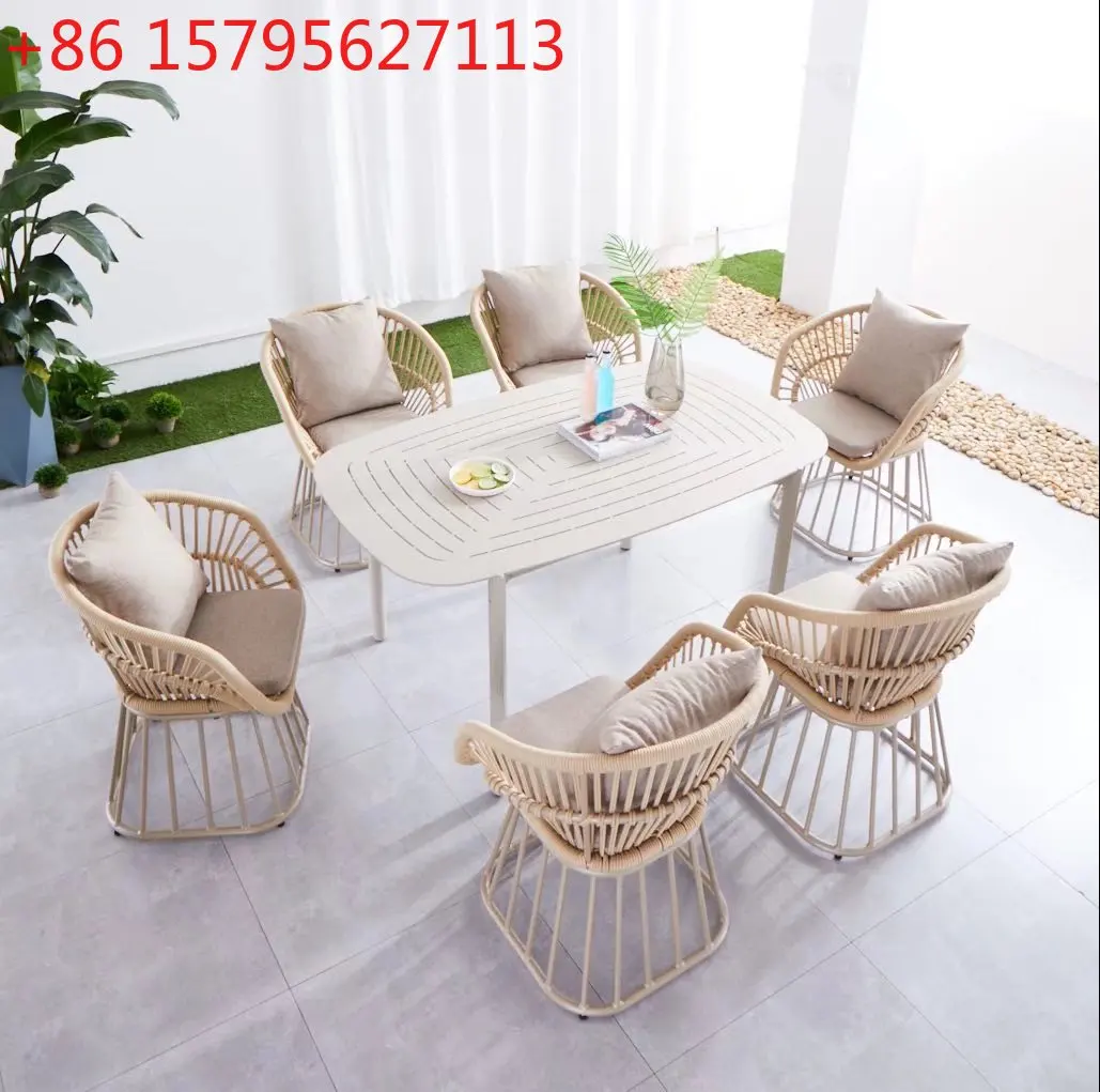 

Открытый балкон, двор, отдых, стул из ротанга, открытый приморский отель B & B, креативные водонепроницаемые солнцезащитные столы и стулья