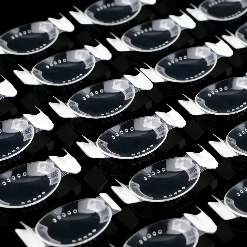 

10-100 шт. Прозрачные самоклеящиеся защитные глазные патчи для использования после операций, пластиковые медицинские эллиптические щитки для глаз, 5x7 см, с множеством отверстий