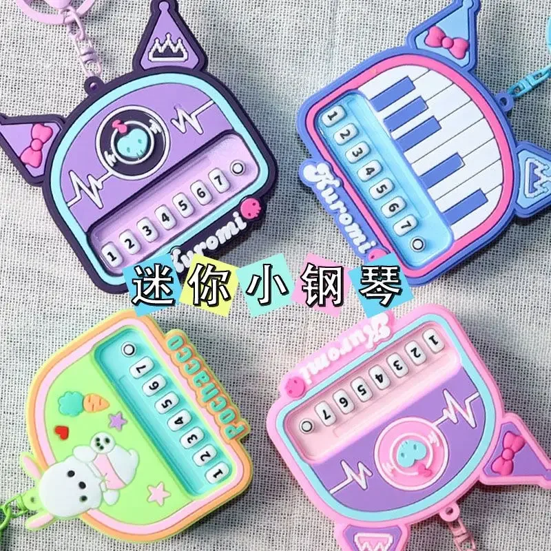 

Sanrio Black Beauty Music Keychain Kawaii Animation Mini Piano Multifunctional Backpack Pendant Student School Bag Decoration