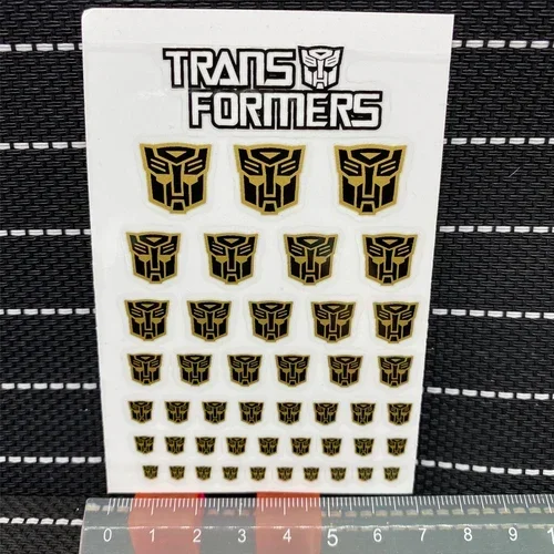 Transformação Brinquedos Adesivos Anime Decepticons Autobots G1 Símbolo Decalque Personalizado DIY Cena Acessórios Decoração Boy Gril Presente