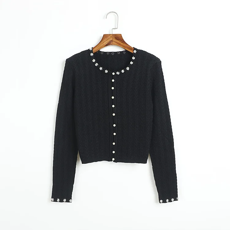 Dames gele kabelgebreide mouwloze maxi-jurk O-hals parelversiering wijde zoom Franse jurken zoete stijl casual gebreide jurk