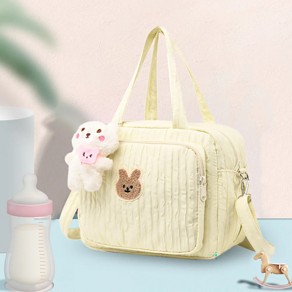 Fashionable outdoor portable single-shoulder mommy bag; multi-functional large-capacity lightweight handheld mother's bag