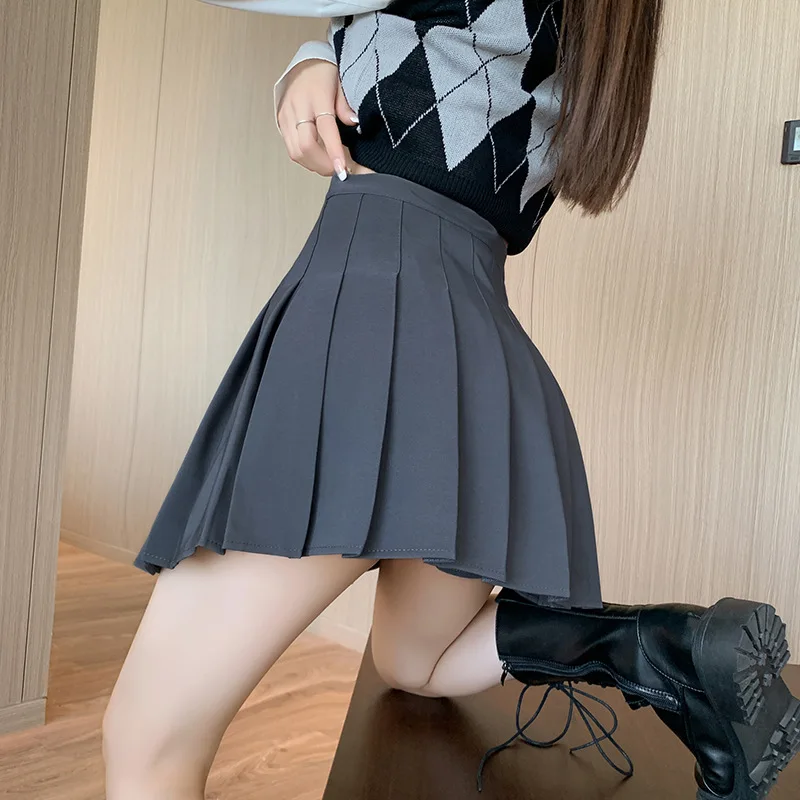 

Лето 2026: Новая утягивающая юбка-униформа JK, однотонная, с завышенной талией, А-силуэт, мини-юбка, модная простая плиссированная короткая юбка для студенток