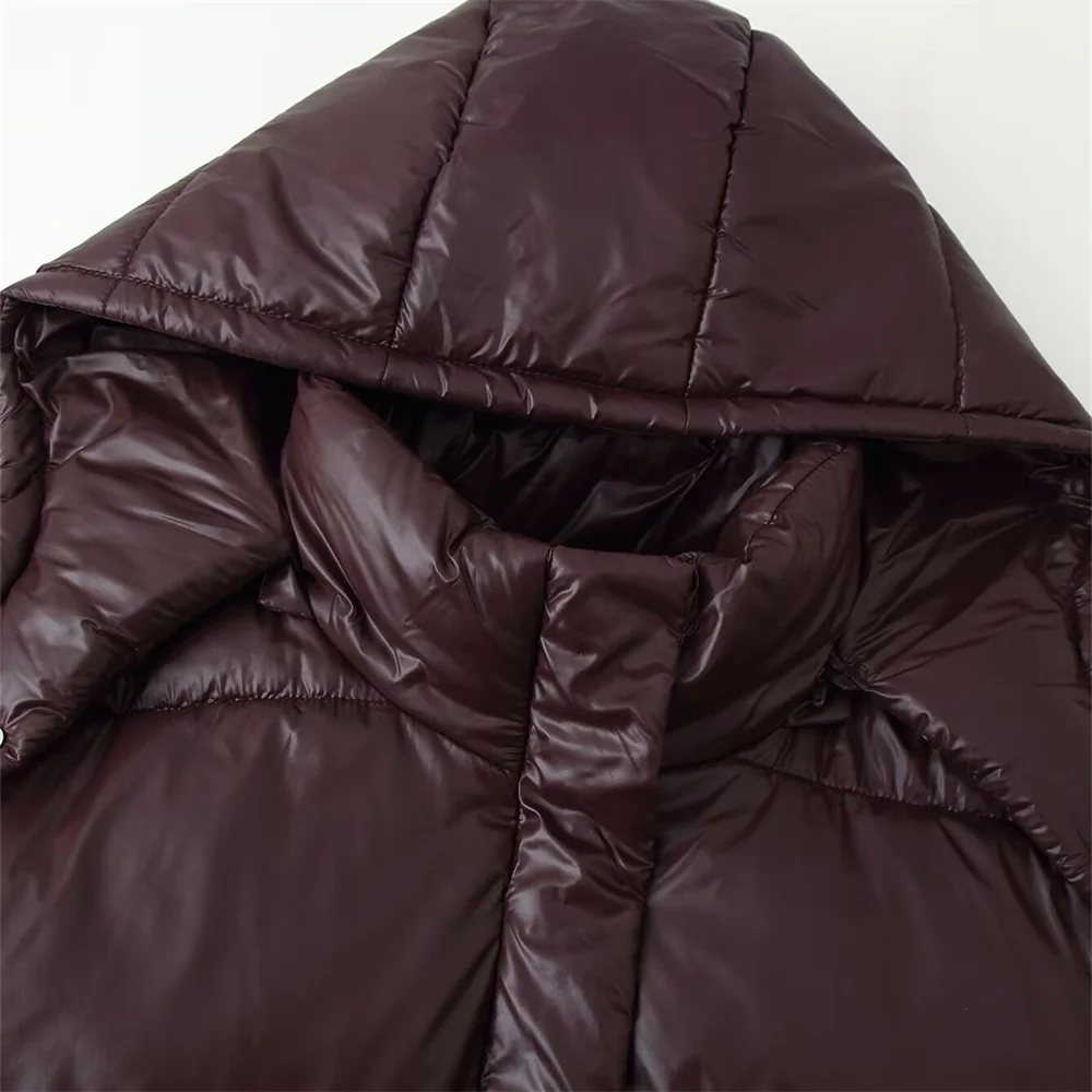 Zimowa nowa damska kurtka bawełniana o luźnym kroju, zapinana na zamek, z długim rękawem, stójką, kapturem, błyszcząca, typu kurtka chlebowa.