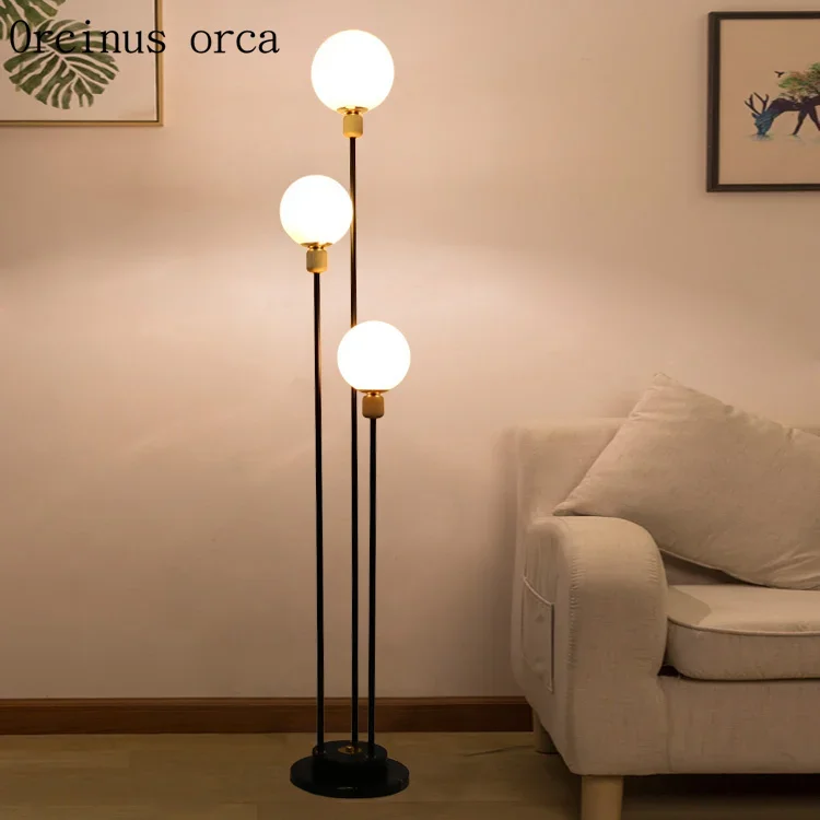 

Modern simple glass ball floor lamp living room bedside lamp creative personality fashionable long LED floor lamp free shipping