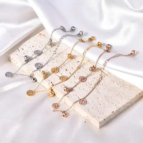 Nueva tobillera de acero de titanio con campana de moneda de cobre para mujer, tobillera inteligente de acero inoxidable de estilo étnico de oro rosa, joyería