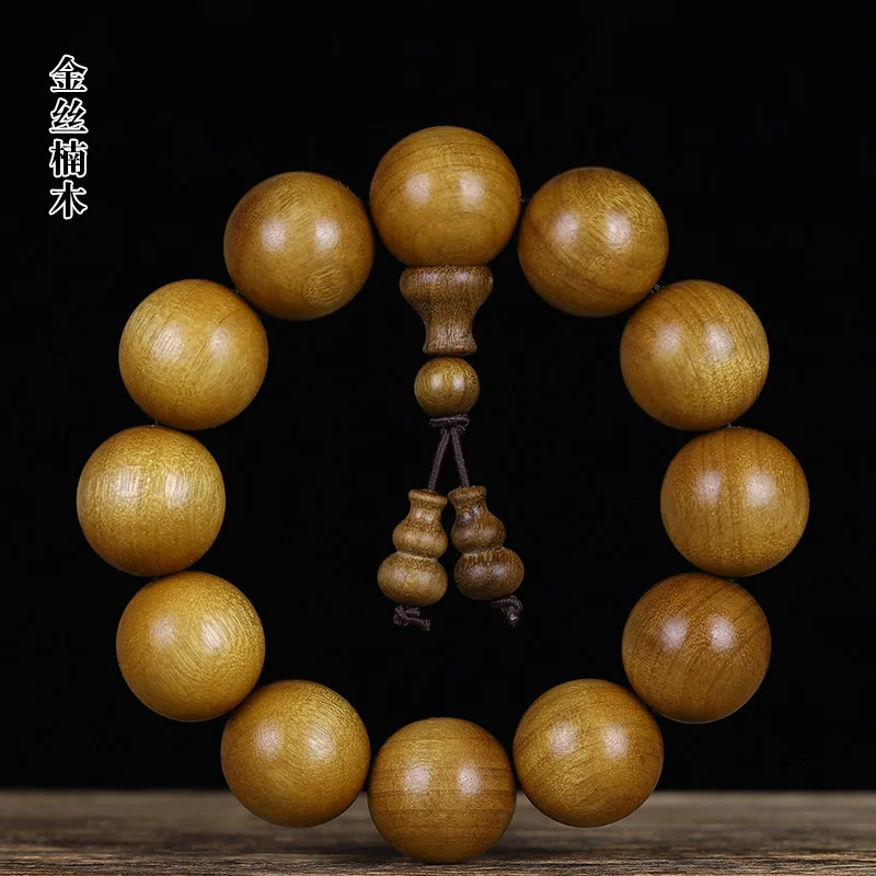 Bracelet made of dark ebony and small-leaf zhennan wood, Buddhist beads, unisex wooden jewelry