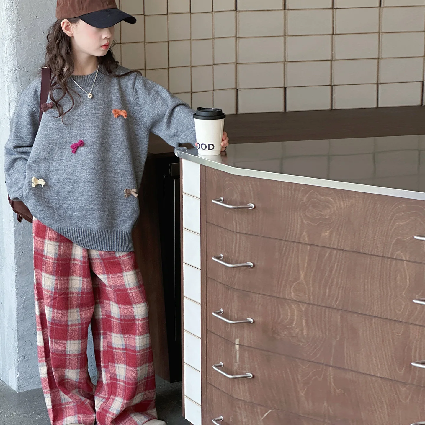 

Girls' Korean Sweater Spring and Autumn 2025 New Children's Knitted Sweater Mid to Large Children's Versatile Bow Autumn