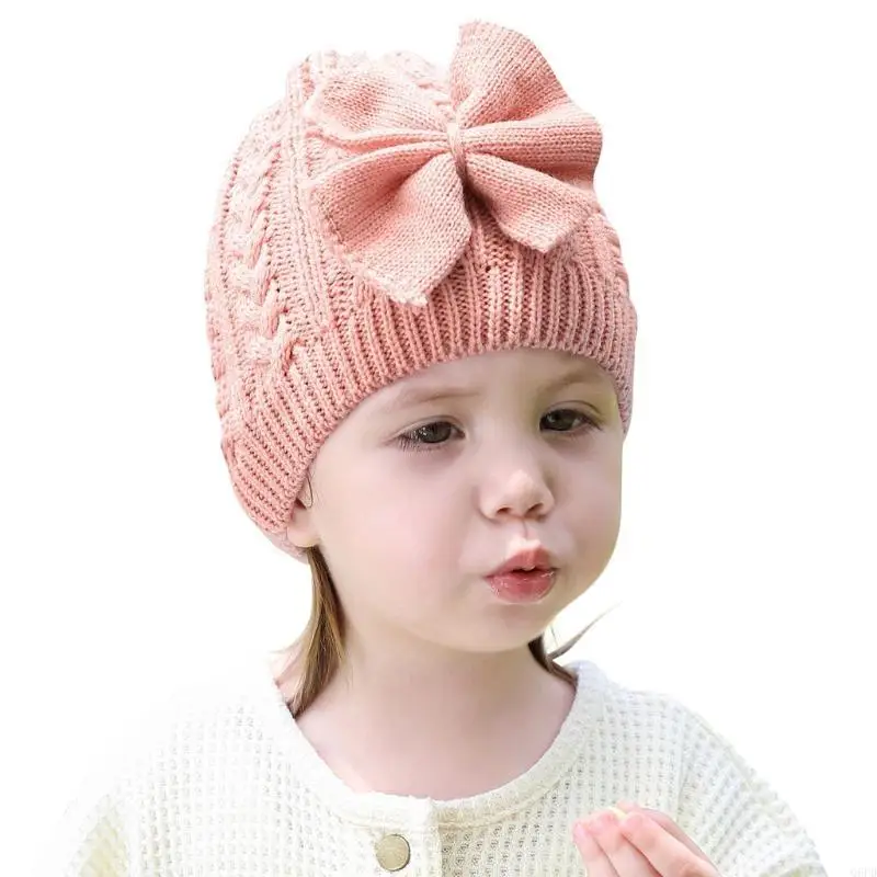 Cappello lavorato a maglia in unita Cappello lavorato a maglia con fiocco per bambini Casual all'aperto Autunno e inverno