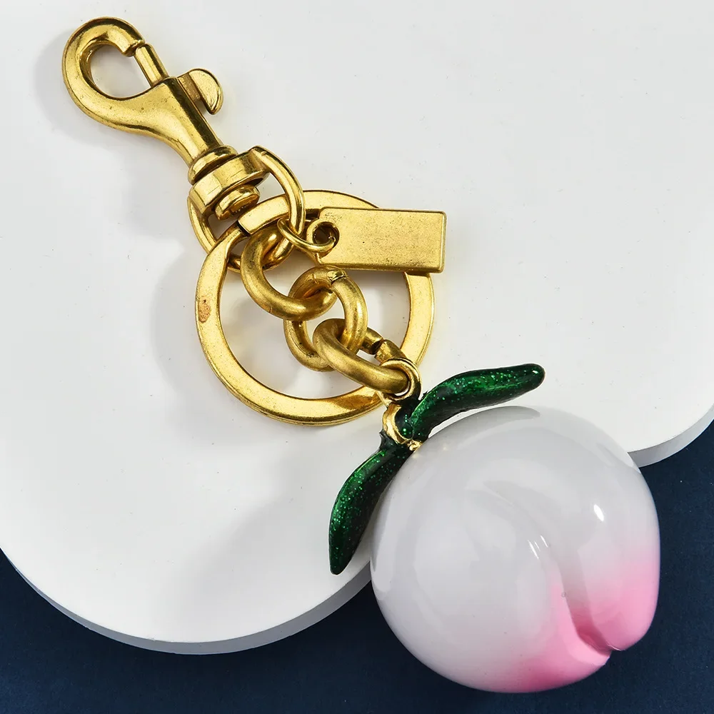 

New products: Creative resin fruit, cute peach handbag, keychain, bag pendant