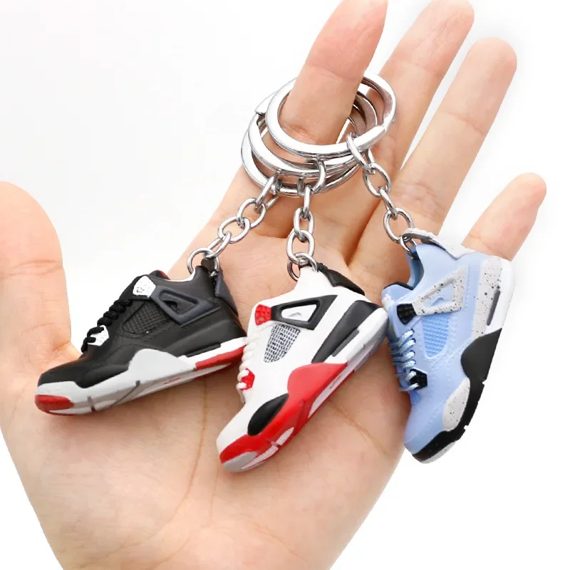 Aj4 white cement blue keychain 3D stereo sneakers pendant four generation model bag jewelry pendant, children's gifts.