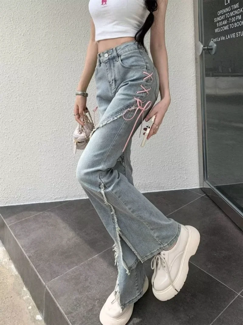Ropa de cintura alta con cremallera para mujer, pantalones sueltos Retro femeninos con borlas, pantalones Micro acampanados, ribete deshilachado, ropa de calle con agujeros, pantalones vaqueros de mezclilla