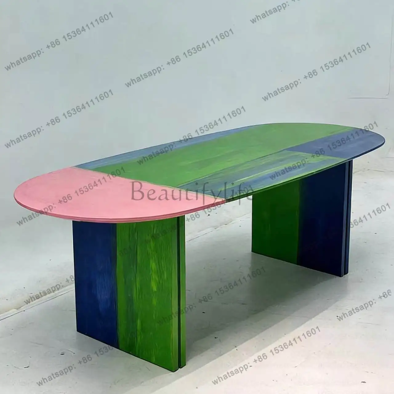 Modern designer creative dopamine personality painted solid wood dining table simple oval high-end artistic dining table