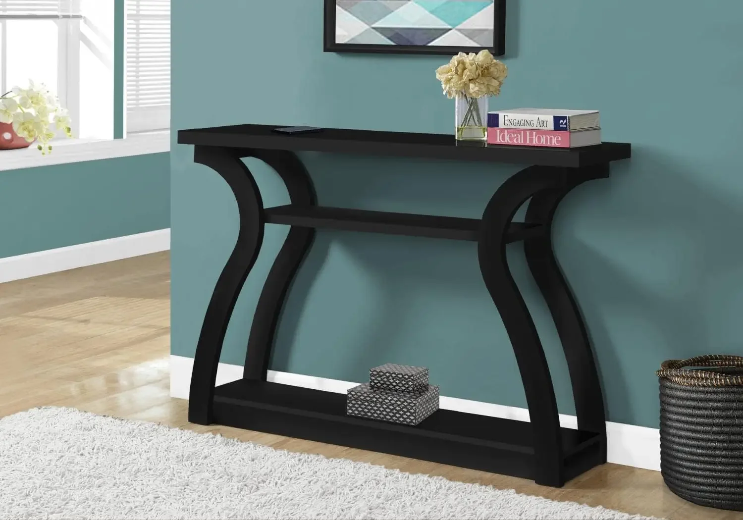 I CONSOLE TABLE, BLACK Three tiered shelf space, open concept design in an elegant black finishUnique and sturdy curved base