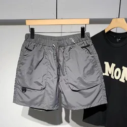 Short cargo multi-poches pour homme, short cargo décontracté, taille élastique, short de plage respirant, séchage rapide, jogging d'entraînement, extérieur