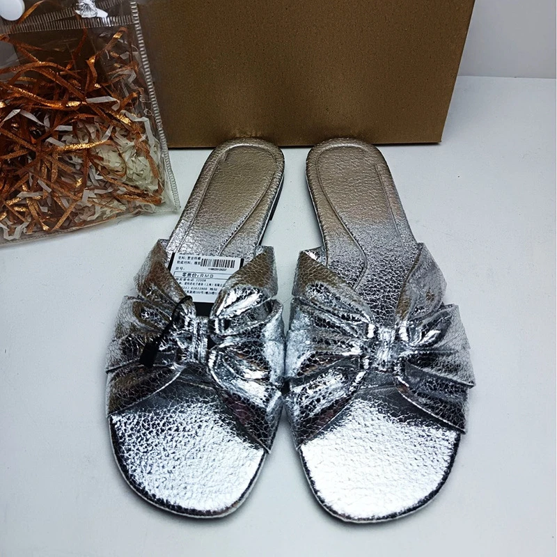 2024 Letnie płaskie kapcie damskie Luxury Silver Diamond Knot Decoration Outdoor Beach Shoes for Lady Open Toe Brand Design Slide