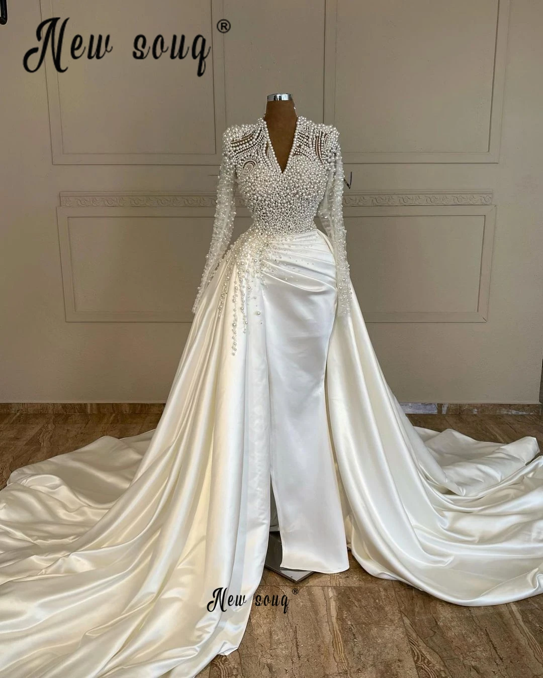 

Full Ivory Pearls V Neck Long Sleeve Wedding Dress With Royal Train Dubai Mermaid Bridal Gown Arabic Elegant Robe de Mariée 2024