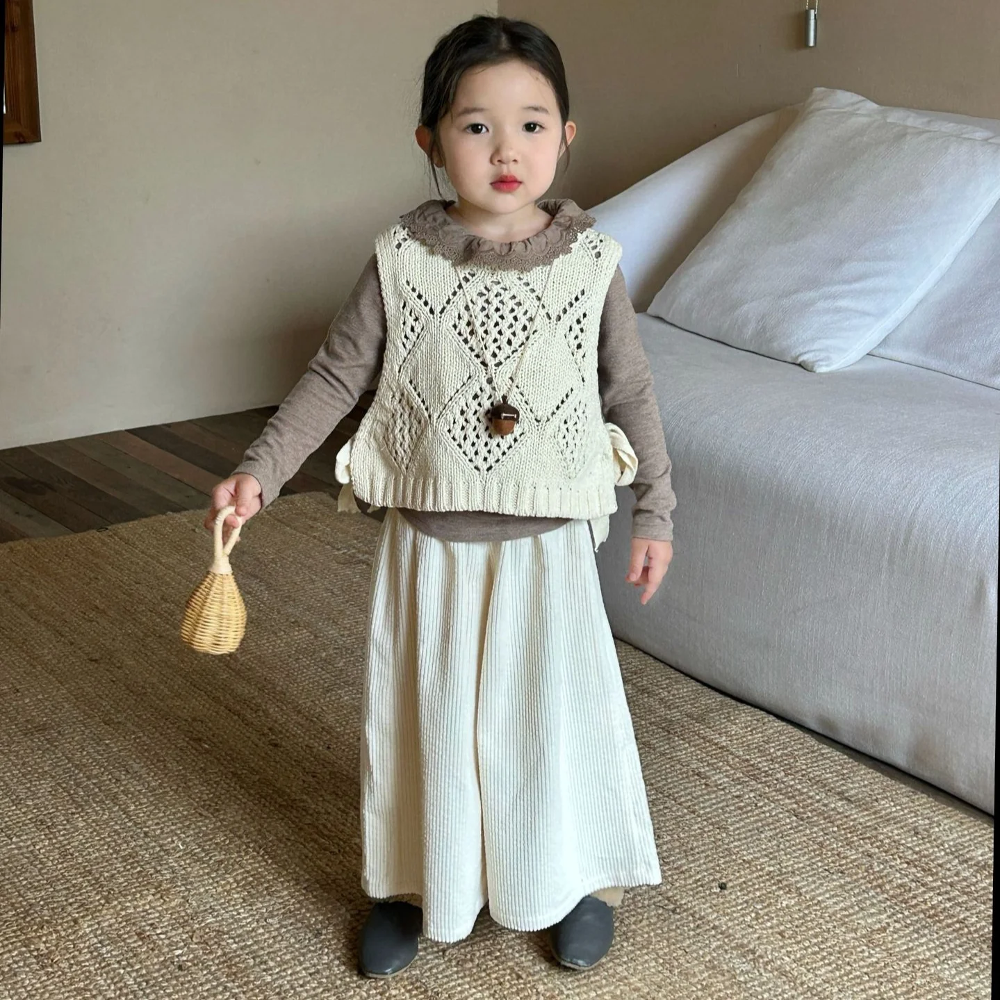 

2024 Autumn Girls Knitted Hollow Wool Vest + Long Sleeve T-shirt + Wide Leg Pants Three-piece Set